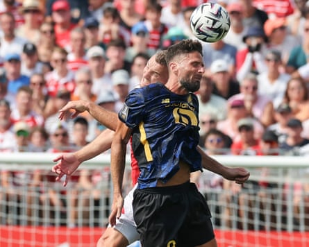 Lille’s Olivier Giroud battles for the ball.