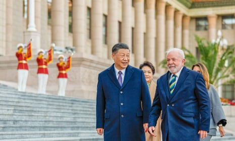 Brazilian president Luiz Inácio Lula da Silva (R) meets Chinese president Xi Jinping in Beijing.