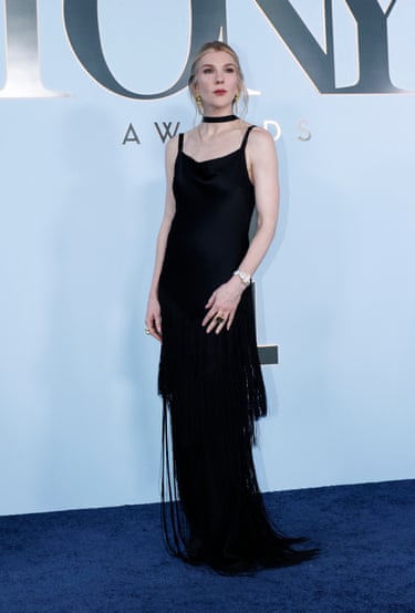 Lily Rabe in a black fringed dress