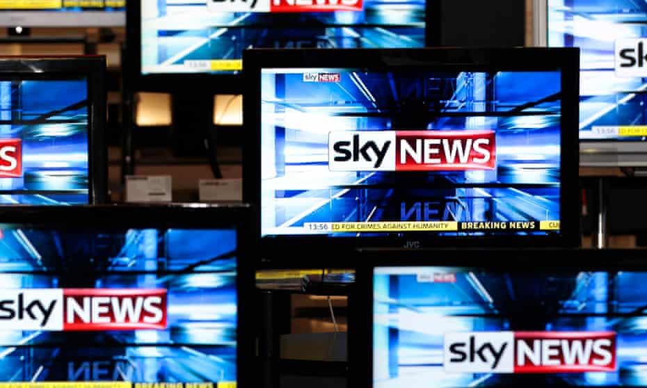 The Sky News logo is seen on television screens in an electrical store