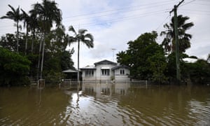 A house is surrounded by flood water in the suburb of Hermit Park in Townsville, Queensland, Australia, 6 February 2019.
