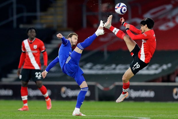 Leicester City’s English midfielder James Maddison vies with Southampton’s Japanese midfielder Takumi Minamino at St Mary’s Stadium.