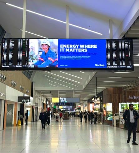An ad for Santos on a digital billboard, seen in an airport