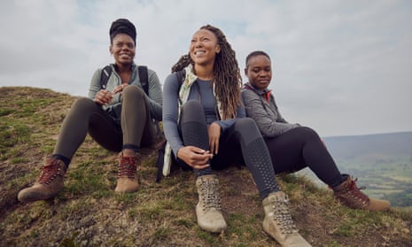 Rhiane Fatinikun (centre) of Black Girls Hike with two other women.