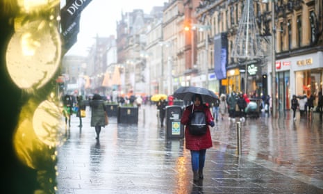 Christmas shoppers in Glasgow city centre in early December, as Storm Barra brought trong winds, heavy rain and snow.
