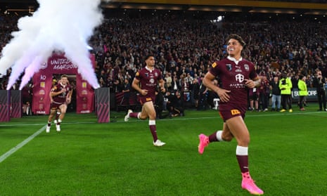 Reece Walsh leads other maroons on to the pitch