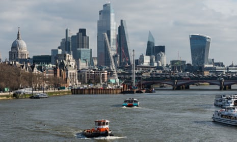 A view of the skyscrapers of the City of London financial district over the River Thames
