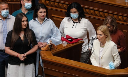 Members of the Ukrainian Parliament brought high-heeled shoes to the rostrum of the Verkhovna Rada in protest and demanded an investigation into the incident.