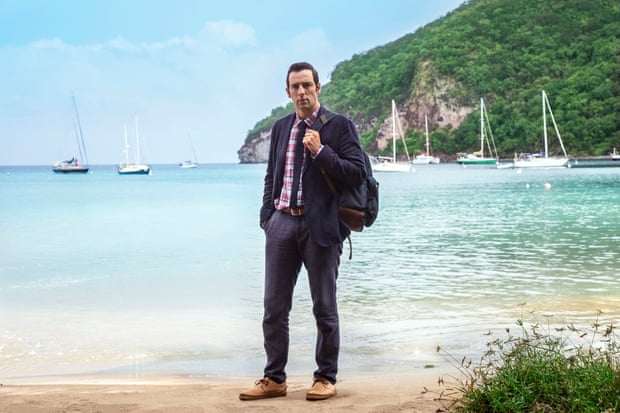 Ralf Little as DI Neville Parker in Death in Paradise.