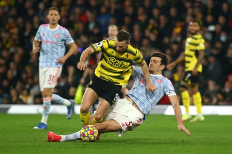 Tom Cleverley of Watford is fouled by Harry Maguire of Manchester United leading to a second yellow card and red card.