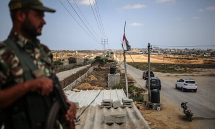 A soldier at the Palestinian side of the Rafah border crossing