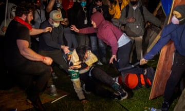 Demonstrators clash at an encampment at UCLA, Los Angeles