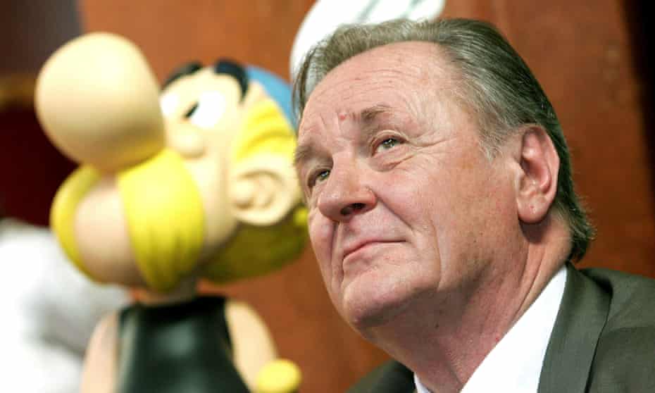 Albert Uderzo sits next to a model of Asterix during a news conference in Brussels in 2005. 