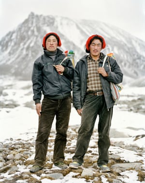 Pilgrims Lo Sang Yei Shi and Tei Mei Gyel Tsok on Mount Kailash, one of the most sacred spots on earth