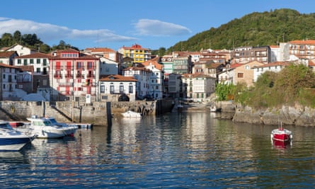 The harbour, with several small fishing boats, at Mundaka, Basque country, Spain.