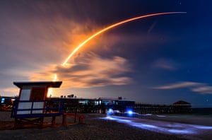 Miami, US. The trail of a SpaceX Falcon 9 rocket lights the sky after taking off from Cape Canaveral
