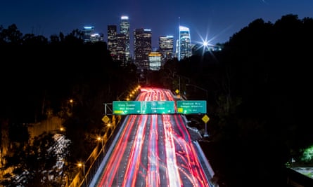 The taillights of cars on a freeway in Los Angeles.