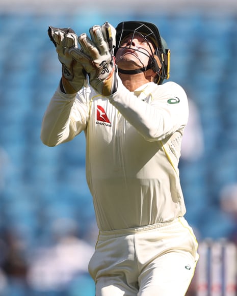 Alex Carey looks up and prepares to take a catch