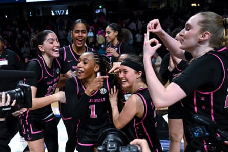 Vanderbilt players observe aft a win.