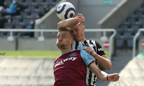 Newcastle United’s Ciaran Clark handles the ball in the area resulting in a penalty being awarded to West Ham United.