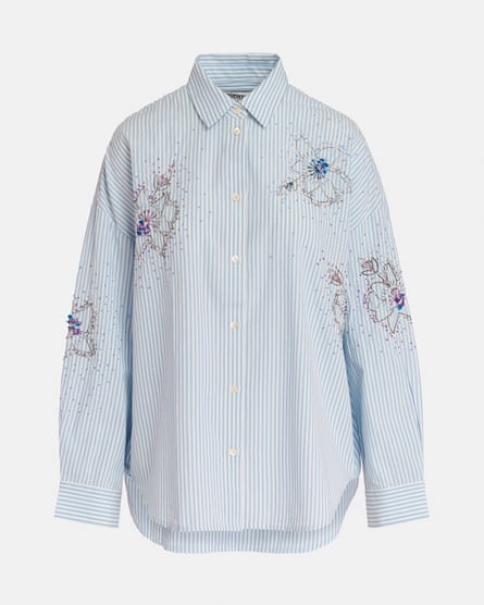 A blue and white striped shirt with floral embellishment from Essentiel Antwerp 
