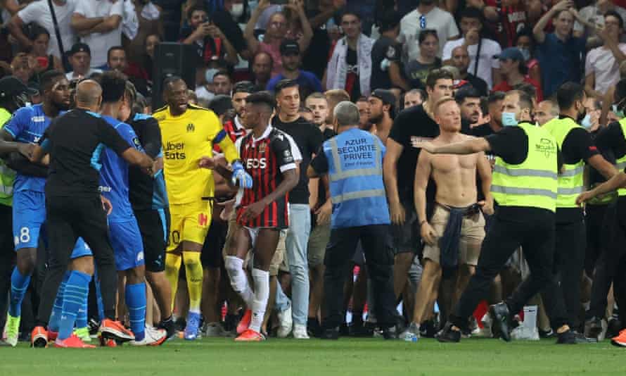 Fans, players and stewards at the Allianz Riviera.