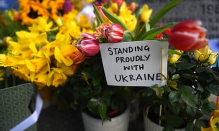 Tributes to Ukraine decorate a monument to St Volodymyr the Great, near Ukraine’s embassy in London, Britain, 10 March 2022.