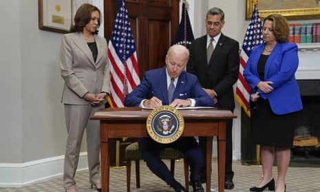 President Joe Biden signs an executive order on abortion access during an event in the Roosevelt Room of the White House, Friday, July 8, 2022, in Washington.