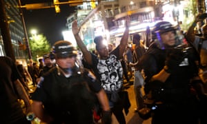 Demonstrators protest police violence in September 2016 in Charlotte, North Carolina. Young black men were nine times more likely than other Americans to be killed by police last year.
