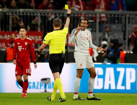 Matip, not happy with the yellow card.