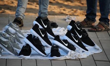 Copies of popular brands of shoes sold on Barceloneta beach