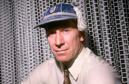 Charlton wearing his 100th England cap at home in Lymm.