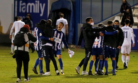Alcoyano players celebrate after their famous victory against Real Madrid.