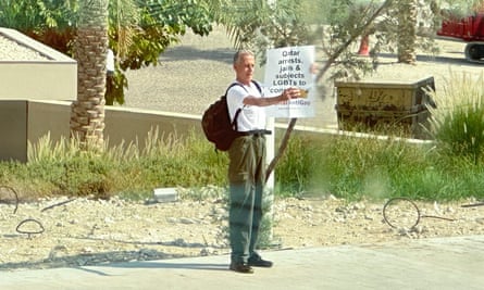 British LGBT rights campaigner Peter Tatchell protests outside the National Museum of Qatar.