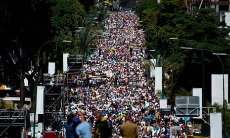 Opposition activists pour to the streets of Caracas to back calls for early elections.