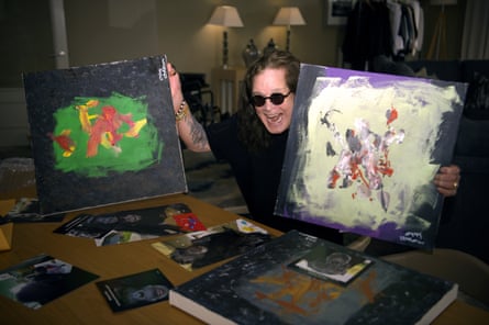 Ozzy Osbourne displays his artworks.