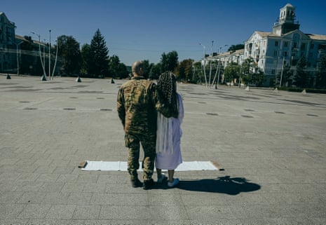 Tetiana and Oleksandr before the ceremony. The empty central square is surrounded by ‘dragon’s teeth’ and anti-drone netting.