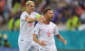 Switzerland’s Haris Seferovic celebrates scoring.