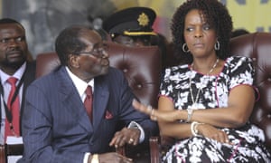 Zimbabwe’s president, Robert Mugabe, sits with his wife Grace during commemorations to mark his birthday last year. 
