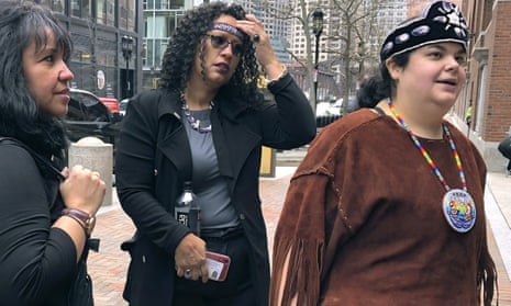 Tela Troge, right, a lawyer who was in court with others, left, who came to support the Mashpee Wampanoag tribe at a hearing over land rights in Taunton, Massachusetts on 5 February.
