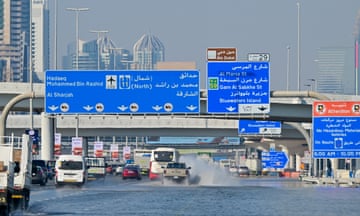 UAE-WEATHER-FLOOD<br>Cars drive down a flooded motorway in Dubai on April 20, 2024. Four people died after the heaviest rainfall on record in the oil-rich UAE on April 16, including two Filipino women who suffocated inside their vehicle in Dubai's flooding. (Photo by Giuseppe CACACE / AFP) (Photo by GIUSEPPE CACACE/AFP via Getty Images)