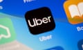 In this photo illustration a close-up of an Uber app is seen on an iPhone