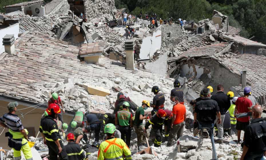 Rescue workers at the scene of the earthquake in central Italy.