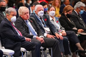 United Nations (UN) Secretary General Antonio Guterres (L), Britain’s Prime Minister Boris Johnson (2nd L) and David Attenborough (3rd L) listen to a speaker during the opening ceremony of the Cop26 UN Climate Change Conference in Glasgow.