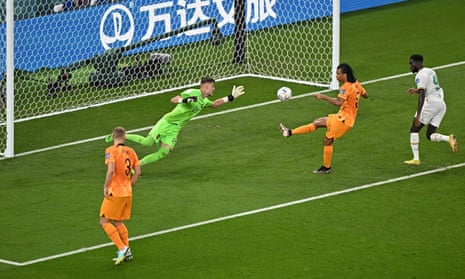 Nathan Ake clears the danger.