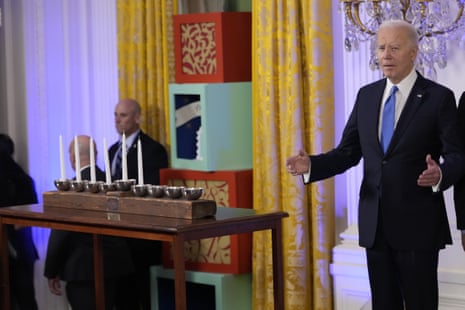 US president Joe Biden arrives to speak at a Hanukkah reception in the East Room of the White House in Washington