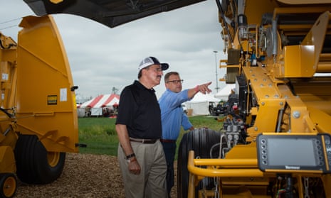 Dennis Slater (left), the president of the Association of Equipment Manufacturers, in talks at the Farm Progress Show in Boone, Iowa.