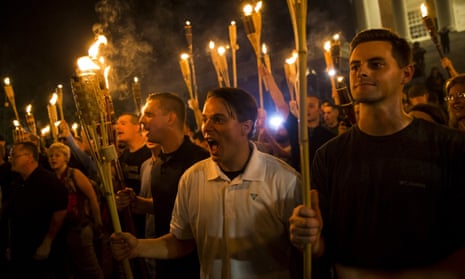 White nationalists chant after marching through the University of Virginia campus with torches in Charlottesville on 11 August 2017.