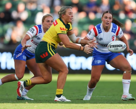 Olivia Higgins passes the ball as the Jillaroos ease through the gaps left by England at HBF Park