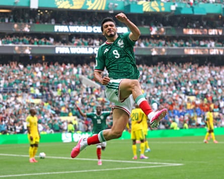 Raúl Jiménez celebrates scoring his team’s second goal during Mexico’s lead against South Africa.